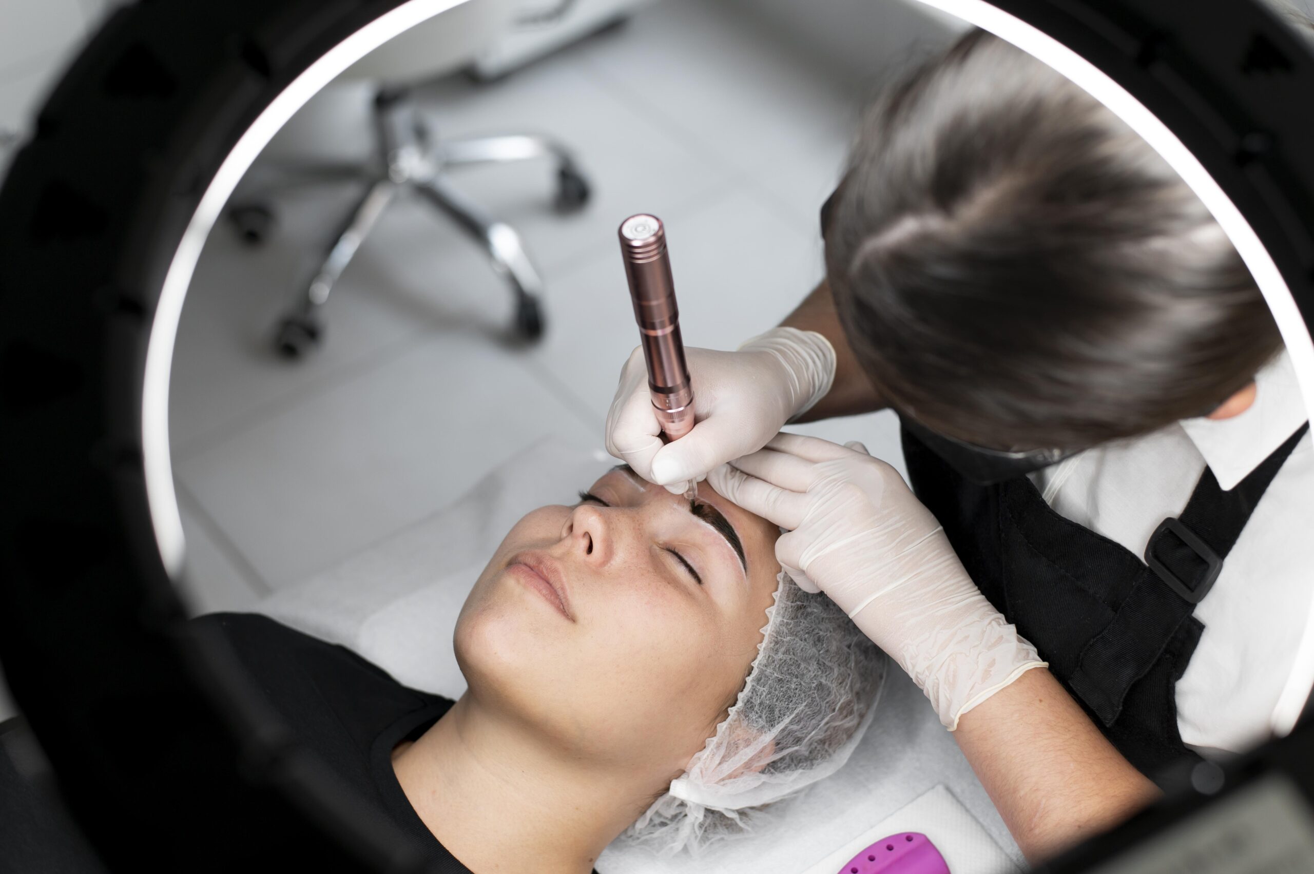 young-woman-going-through-microblading-treatment